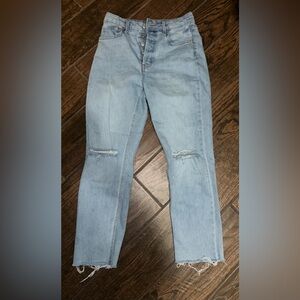 Light wash jeans, two rips on the knee, in great condition, barely worn